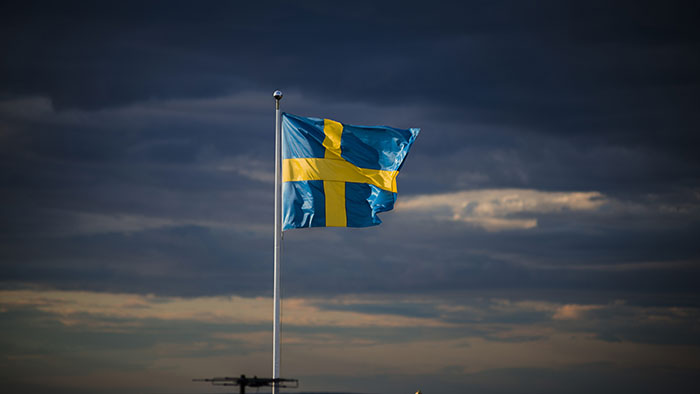 Sveriges BNP ökade mindre än väntat i årstakt - flagg-moln-700_binary_6959041.jpg