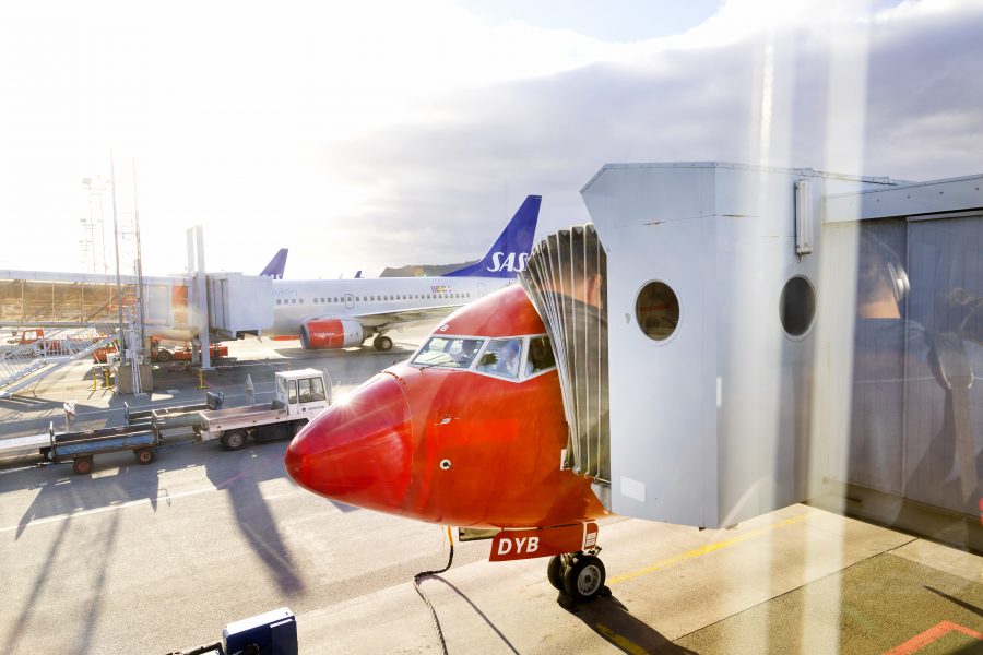 IATA: Flygbranschen lönsam igen 2023 - Norwegian og SAS fly på Gardermoen.