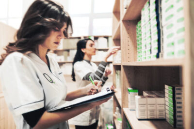Smiling woman pharmacist