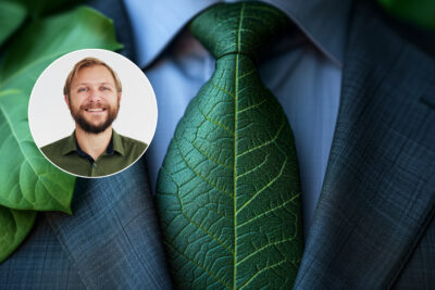 Businessman in a suit wears a tie made of green leaves, symbolizing environmental consciousness. promotes sustainability Ideal for eco-conscious and sustainable business themes